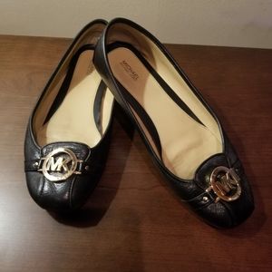 Mk black slip on shoes